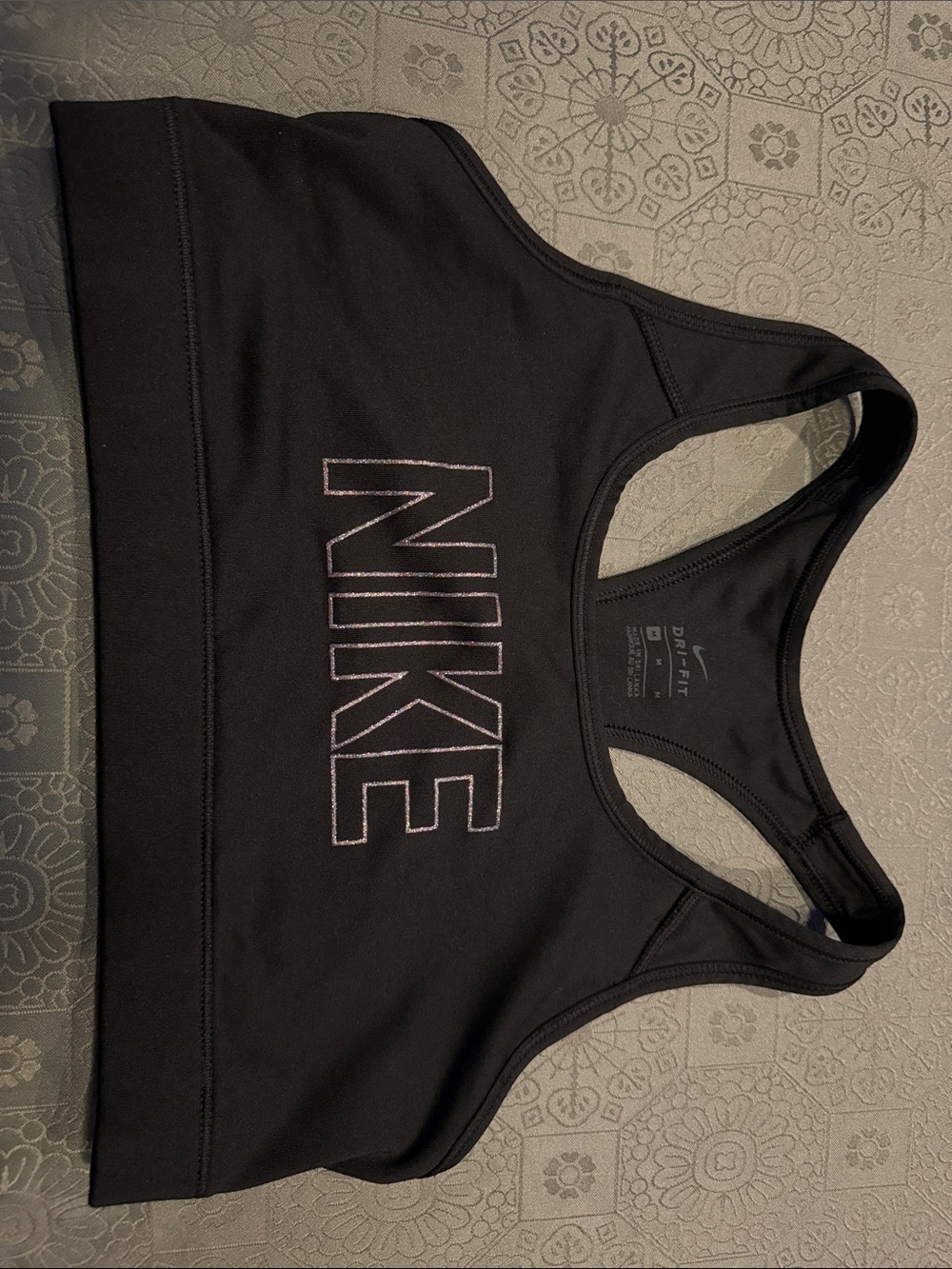 Nike Black Sports Bra with Contrasting White-Outline Logo